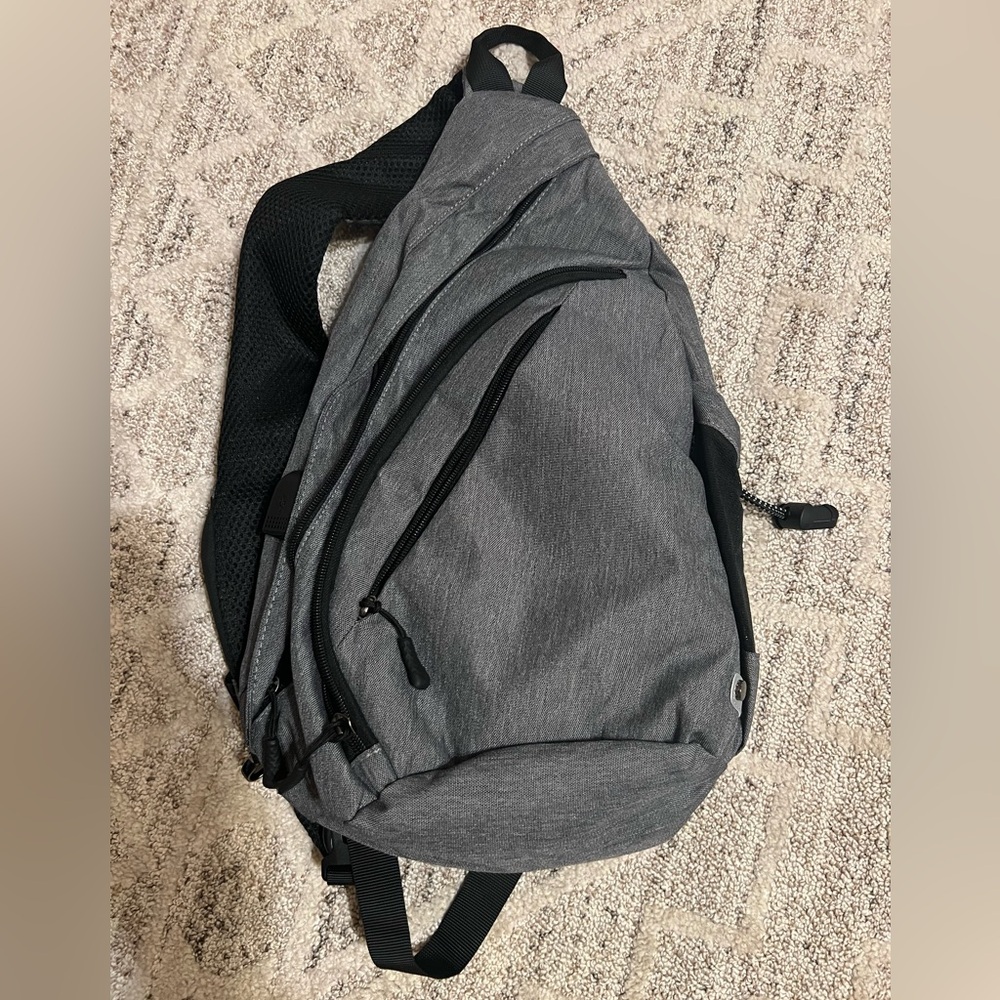 Water proof sling bag/crossbody with USB charging, New, 16” x 10.5” x 4” D